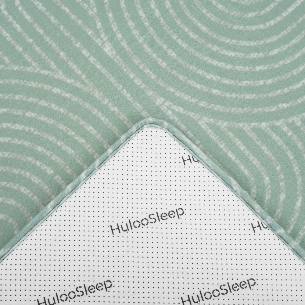 non-slip backing on Huloosleep luna arch geometric sage ivory floor mat