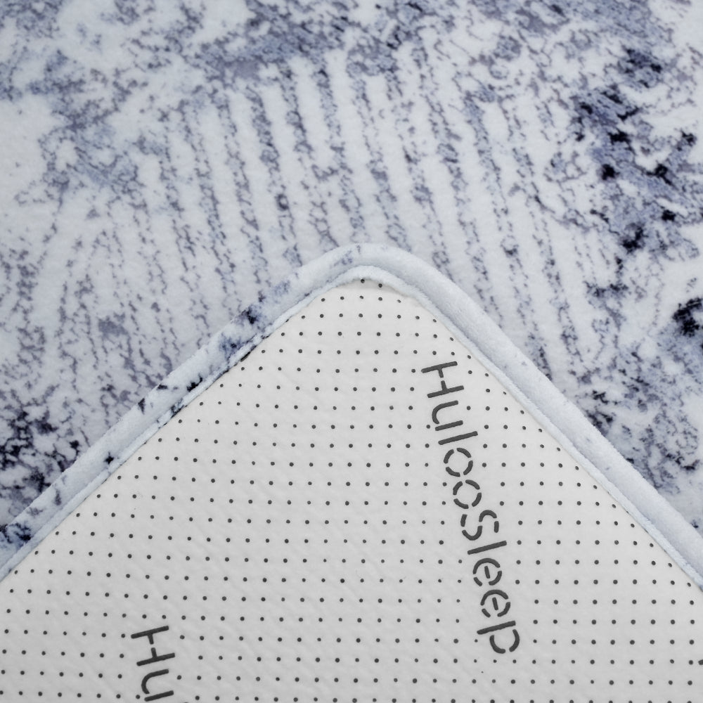 anti-slip silicone dot backing on Huloosleep timeless distressed floor mat